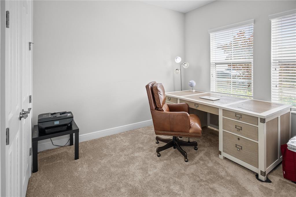14654 Horse Trot Road Lithia, FL 33547 - Photo 4 of 53 a view of a workspace with furniture and a window