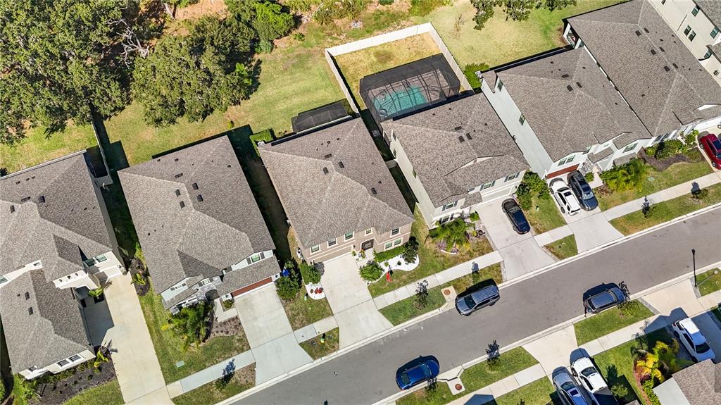 14654 Horse Trot Road Lithia, FL 33547 - Photo 42 of 53 an aerial view of a house with a yard pool outdoor seating and yard