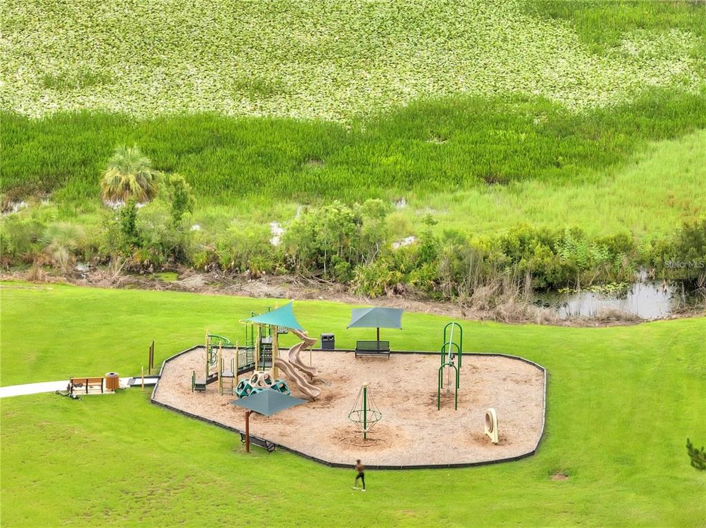 14654 Horse Trot Road Lithia, FL 33547 - Photo 46 of 53 a view of a garden with a sitting area