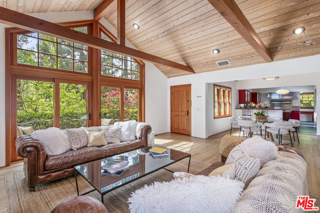 27 Latimer Road Santa Monica, CA 90402 - Photo 6 of 37 a living room with furniture and a large window