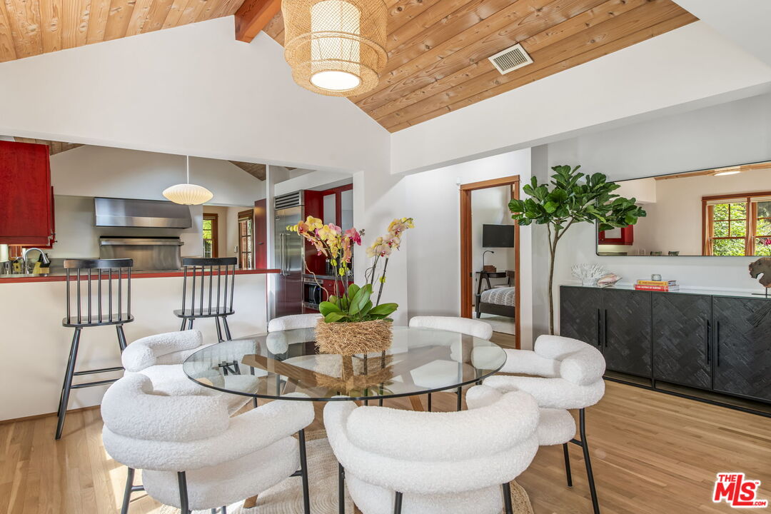 27 Latimer Road Santa Monica, CA 90402 - Photo 8 of 37 a dining room with furniture and wooden floor