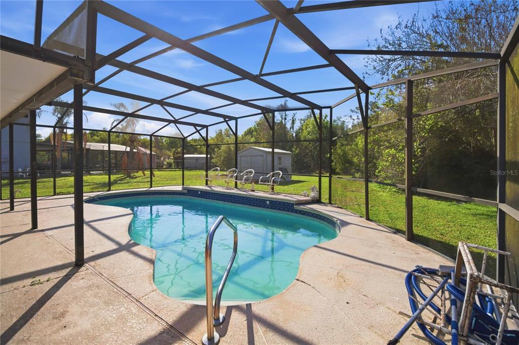 206 Taranto Way Kissimmee, FL 34758 - Photo 35 of 45 a view of swimming pool with a backyard
