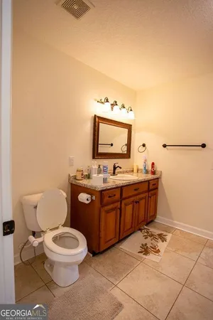 a bathroom with a shower and a sink