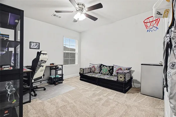 a living room with furniture and a window