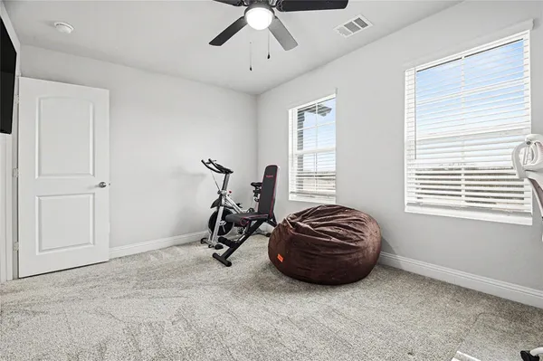 a room with a bed and a chair