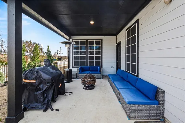 a view of a balcony with couch