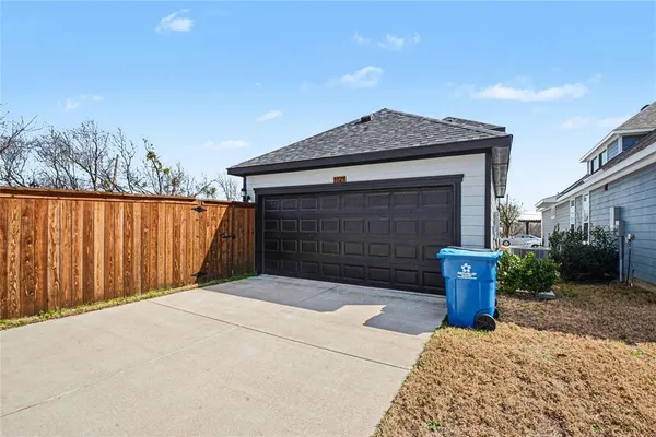 a front view of a house with a garage