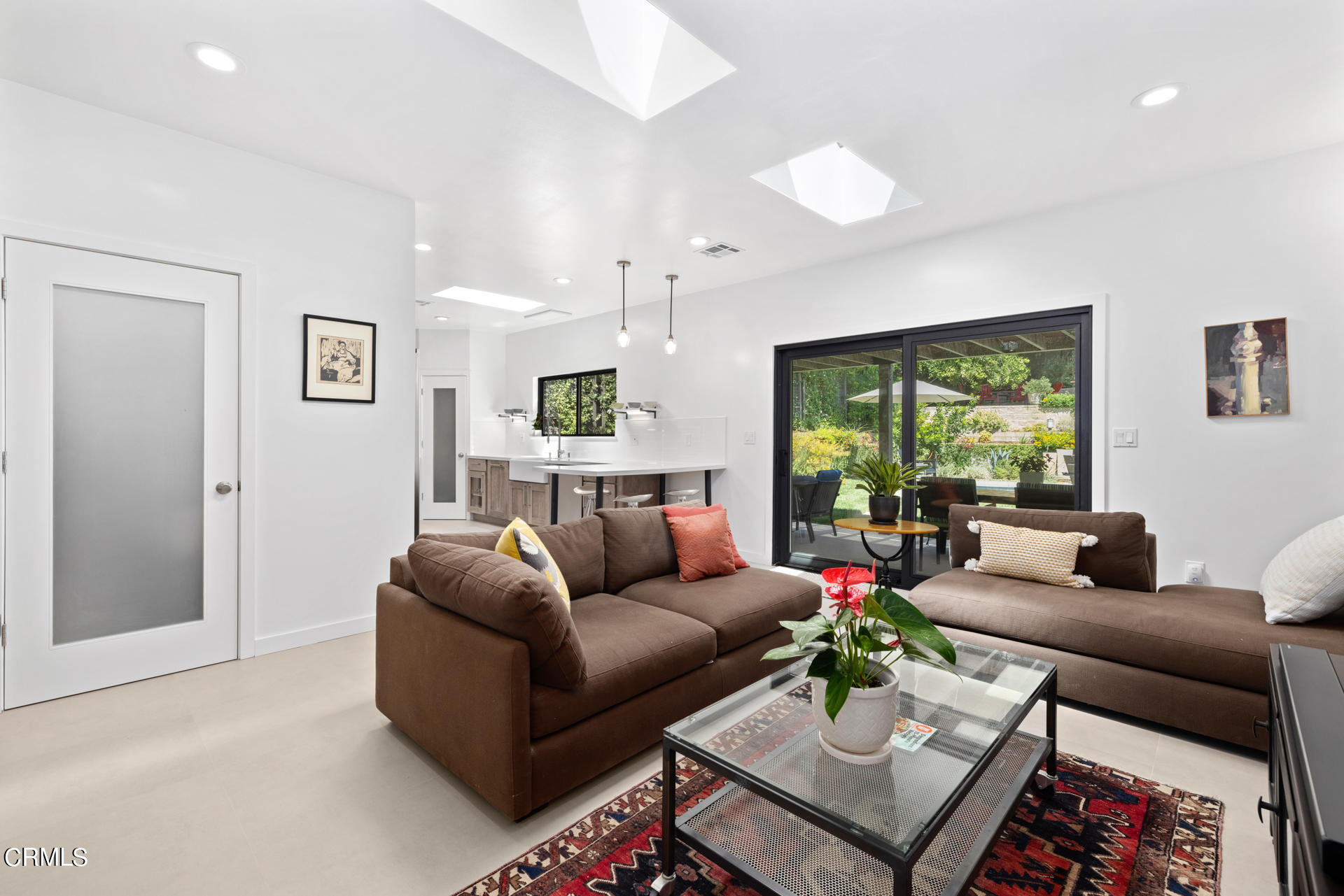 316 Glenullen Drive Pasadena, CA 91105 - Photo 12 of 43 a living room with furniture and a large window