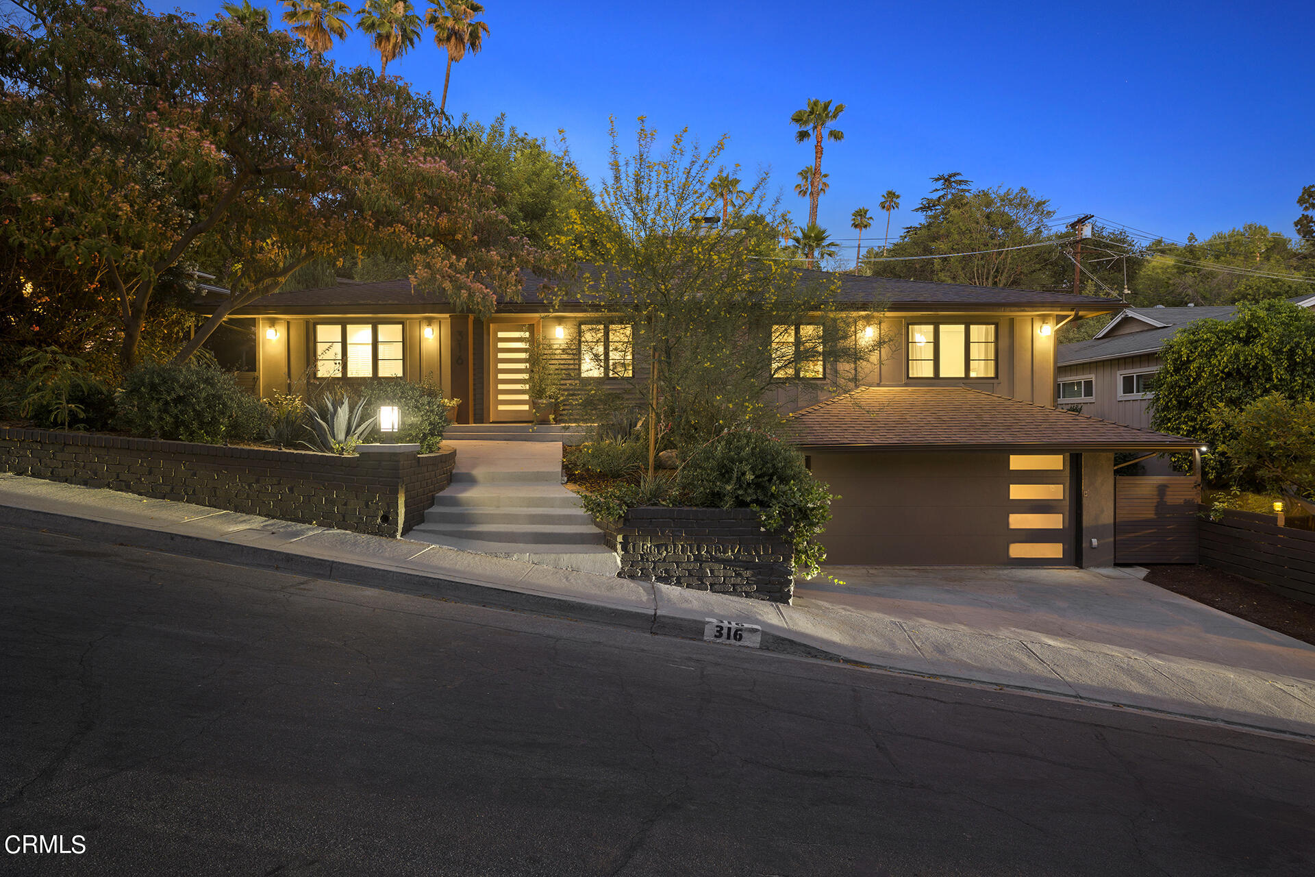 316 Glenullen Drive Pasadena, CA 91105 - Photo 3 of 43 a front view of a house with a yard street and outdoor seating