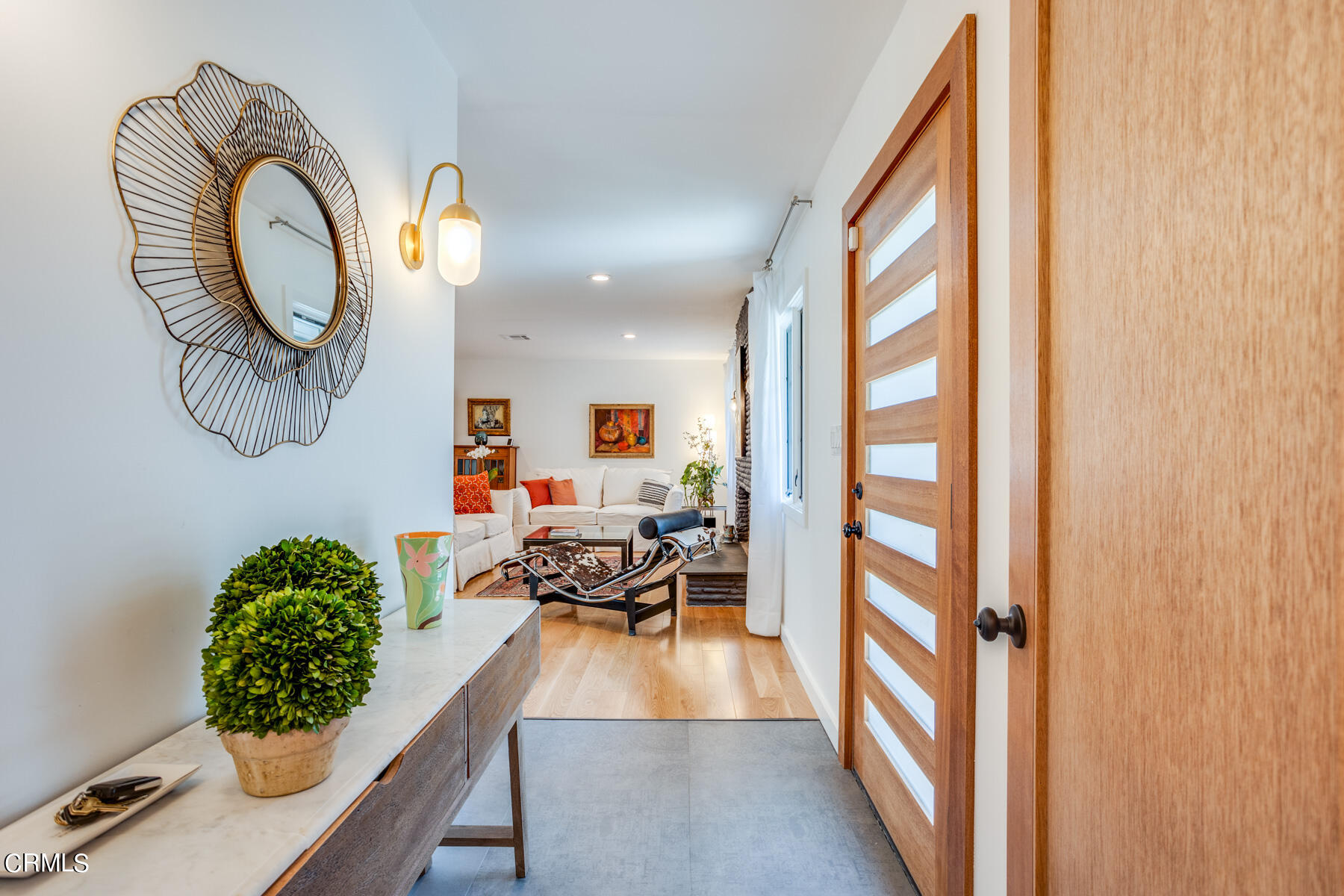 316 Glenullen Drive Pasadena, CA 91105 - Photo 6 of 43 a view of a livingroom with furniture wooden floor and a rug