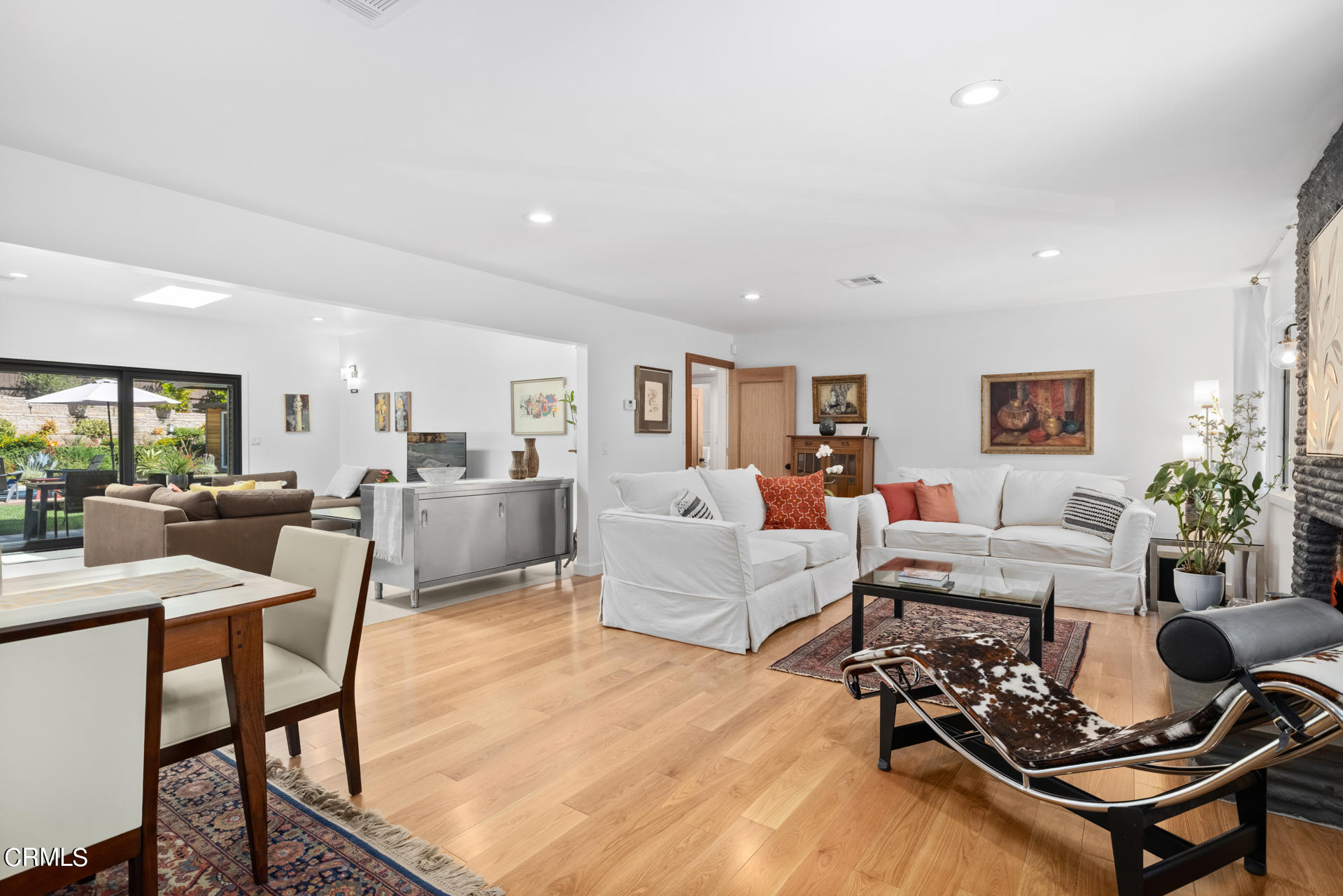 316 Glenullen Drive Pasadena, CA 91105 - Photo 7 of 43 a living room with furniture wooden floor and a table