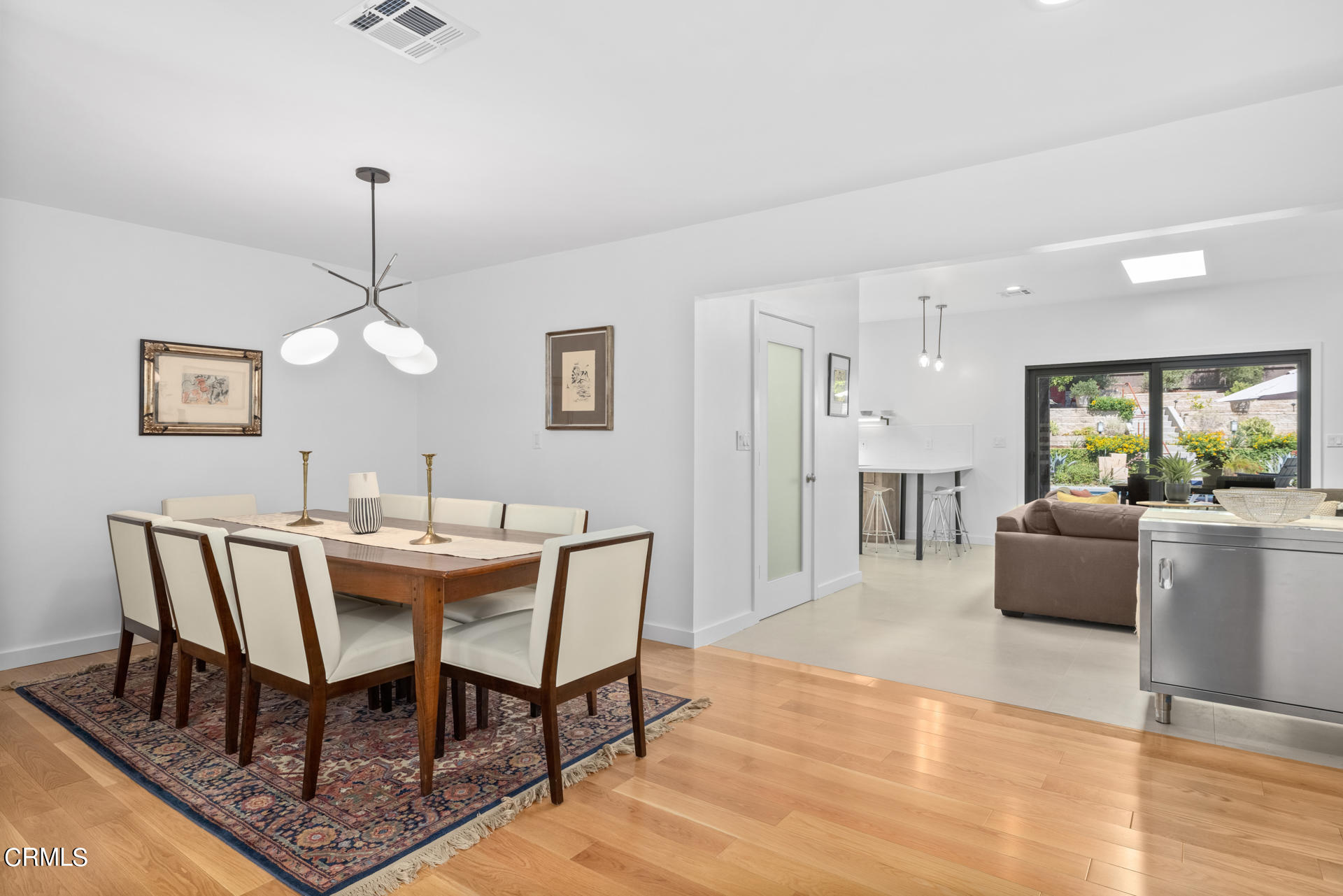 316 Glenullen Drive Pasadena, CA 91105 - Photo 10 of 43 a view of a dining room with furniture window and wooden floor