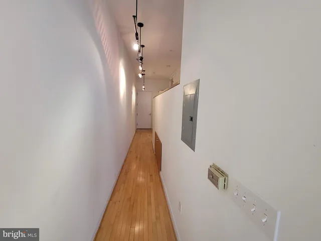 a view of a hallway with entryway