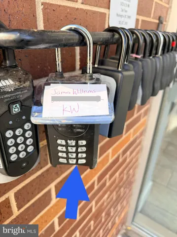 a view of a building with sitting area