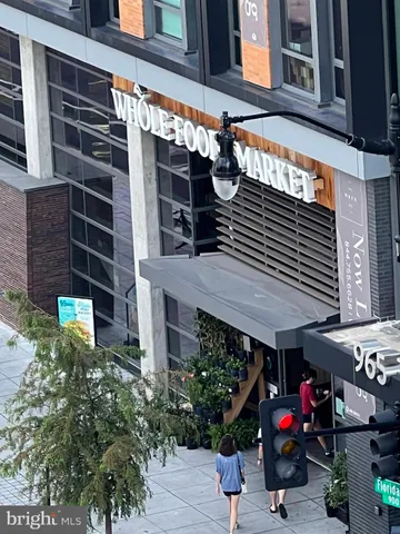 a view of a building with sitting area