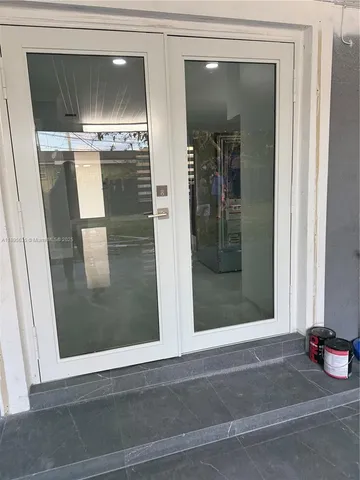 a view of a living room with a bathroom