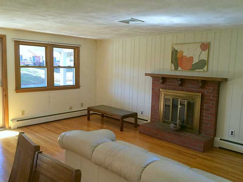 45 Chestnut Road North Kingstown, RI 02852 - Photo 6 of 25 Living Room. wood burning chimney