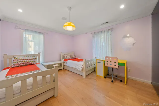 a bathroom with a tub sink toilet and shower