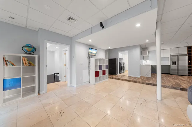 a bathroom with a bathtub and a sink