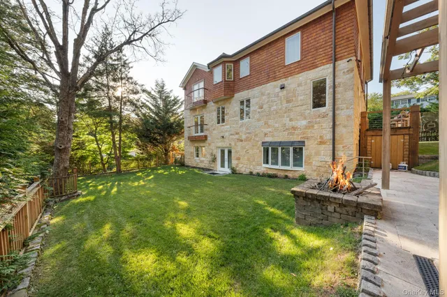 a front view of a building with garden