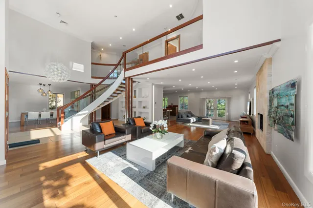 a living room with furniture and a rug