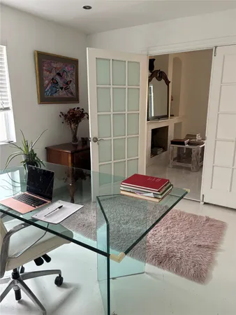 a room with table and couch