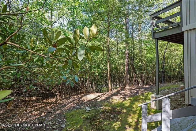 a backyard of a house with seating space