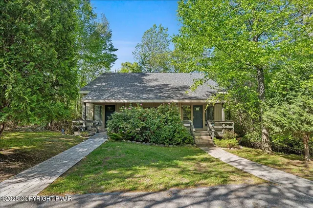 a view of a garden with a lake