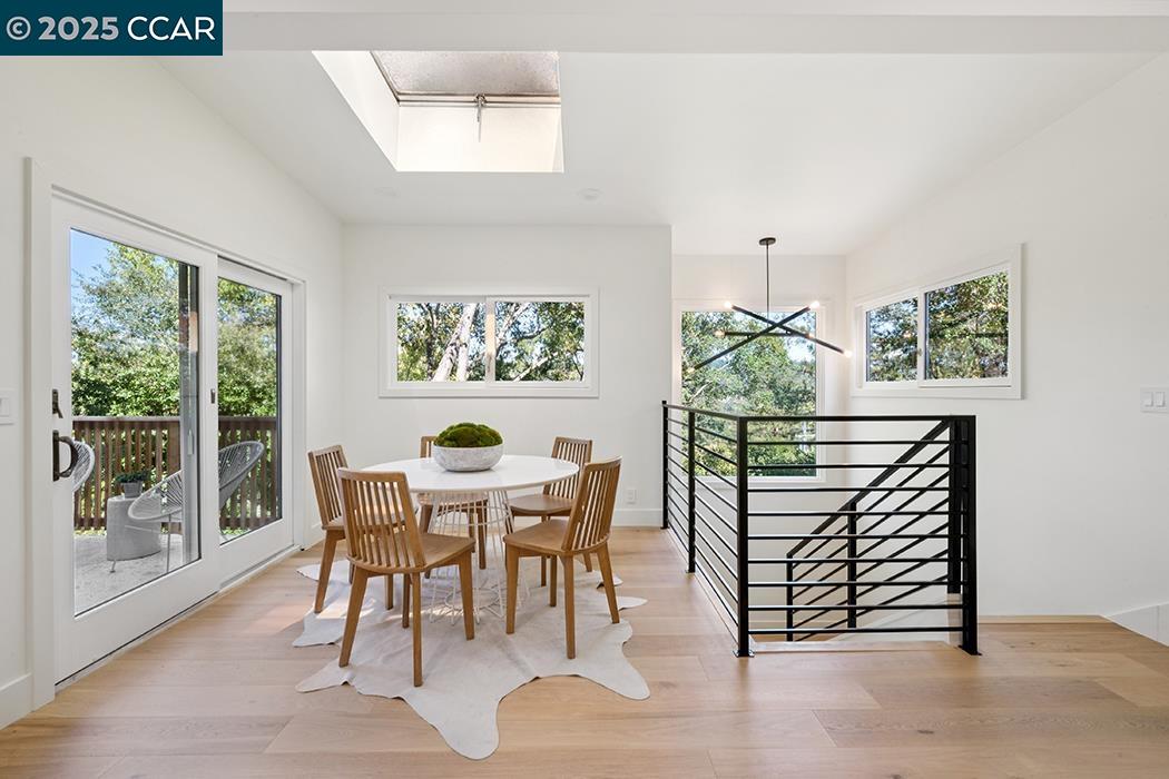26 Berkeley Avenue Orinda, CA 94563 - Photo 11 of 28 a view of a dining room with furniture window and outside view