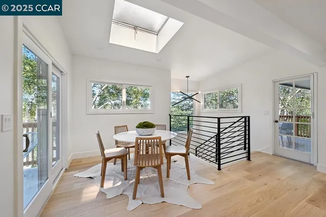 a view of a livingroom with furniture and windows