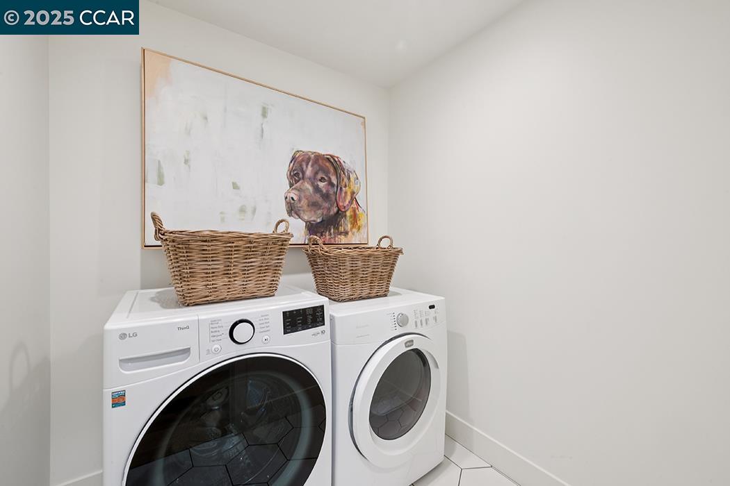 26 Berkeley Avenue Orinda, CA 94563 - Photo 27 of 28 a utility room with dryer and washer