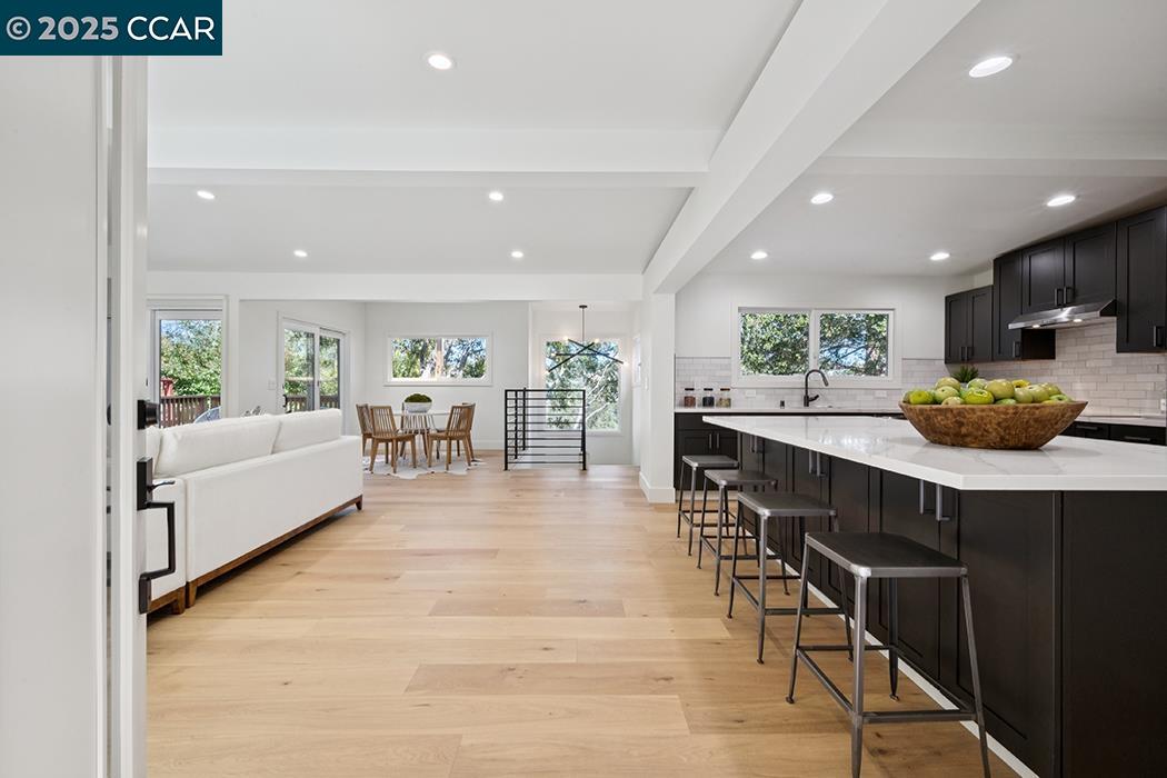 26 Berkeley Avenue Orinda, CA 94563 - Photo 3 of 28 a living room with furniture and wooden floors