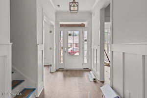 498 Genoe's Point Road Southwest Supply, NC 28462 - Photo 23 of 34 Wainscoting adorned large bright foyer