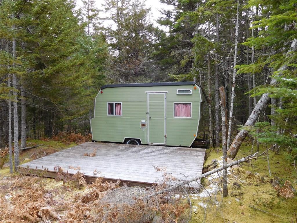 495 Diffin Robbinston, ME 04671 - Photo 12 of 20 Here's the mini trailer--part of the...