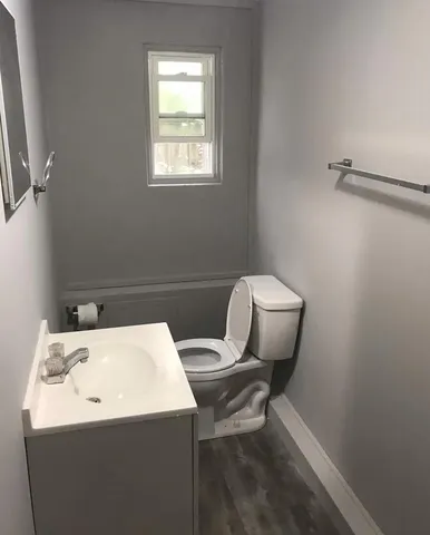 a bathroom with a sink and mirror