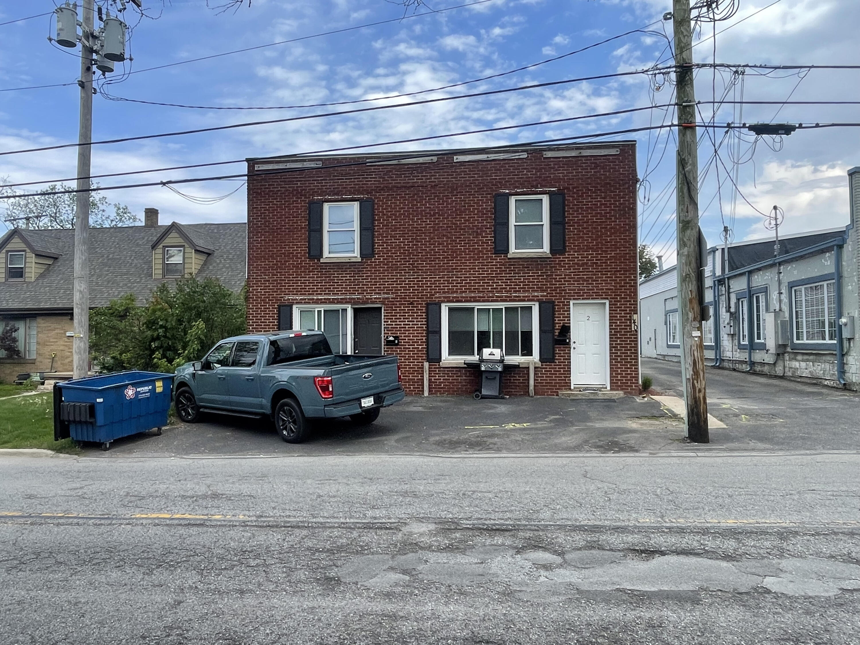 140 North West Street Crown Point, IN 46307 - Photo 2 of 15 a car parked in front of a house