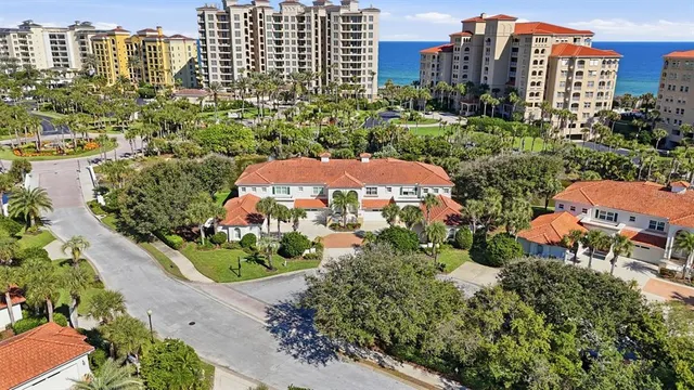 an aerial view of residential building and lake view