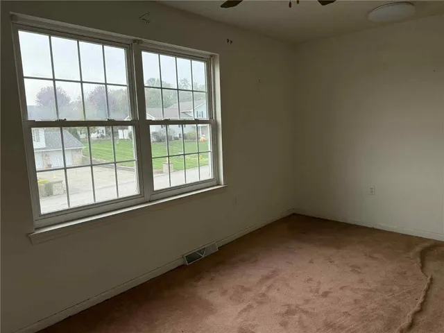 an empty room with a window