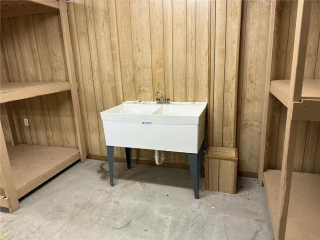 a view of a room with a table and chair