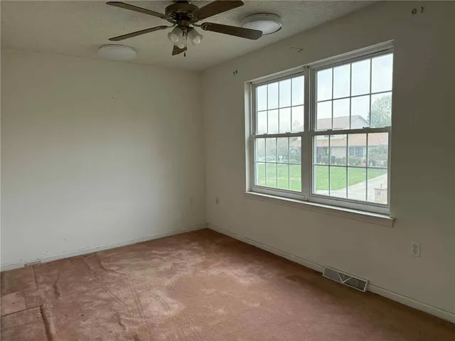 an empty room with a window