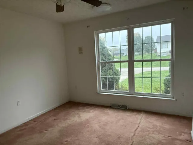 an empty room with a window
