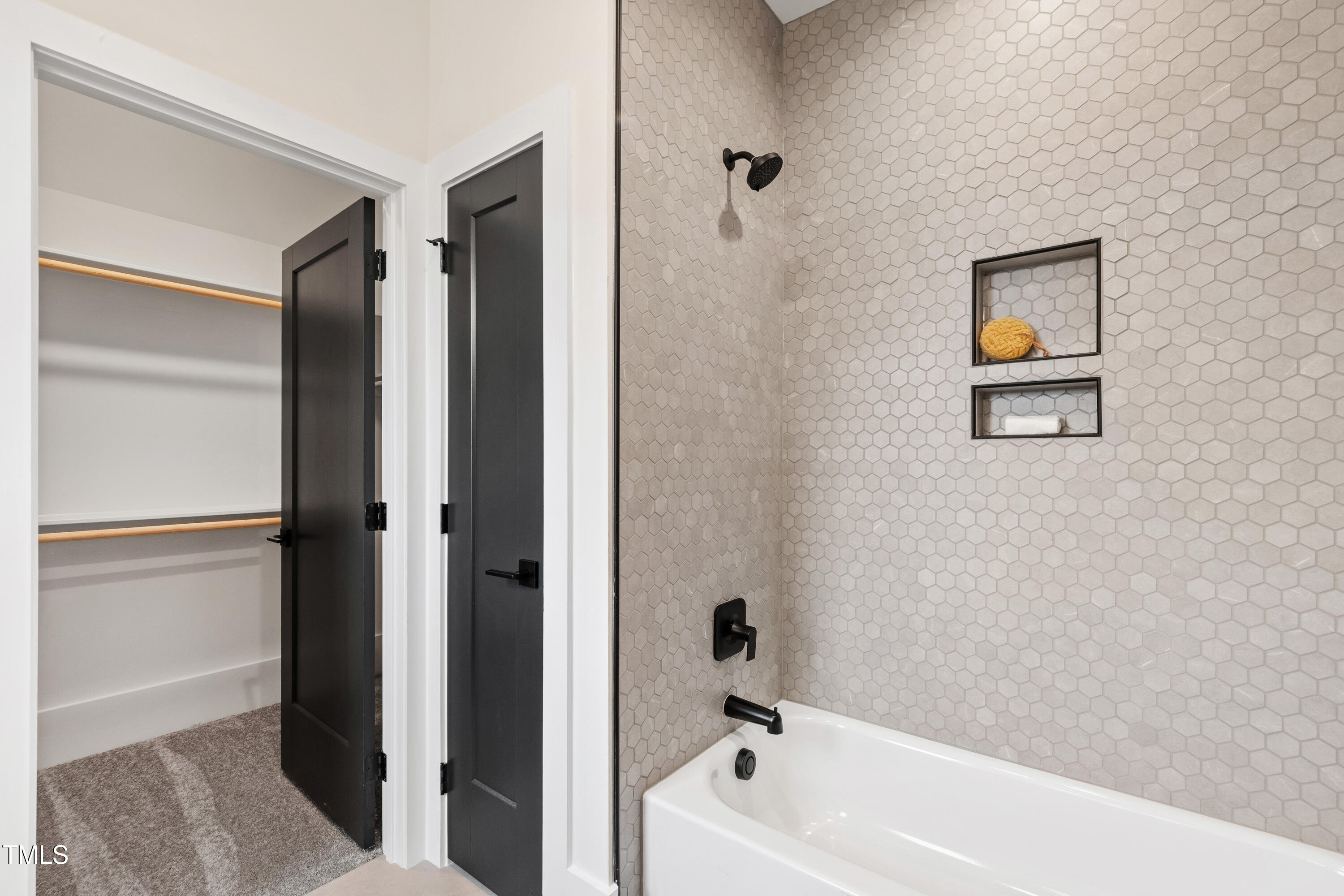 280 Forest Bridge Road Franklinton, NC 27525 - Photo 39 of 65 a bathroom with a bathtub and shower