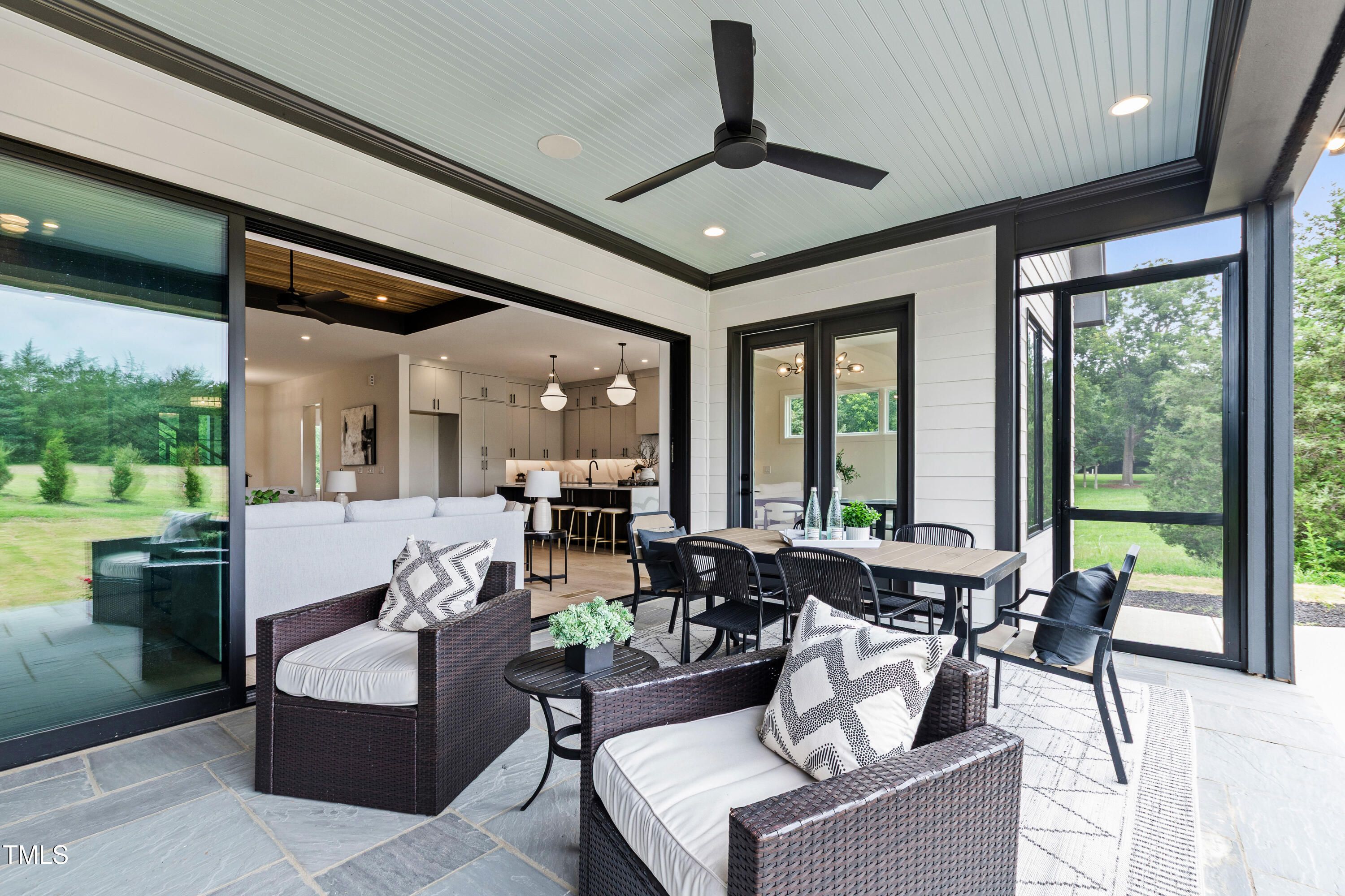 280 Forest Bridge Road Franklinton, NC 27525 - Photo 51 of 65 a living room with fireplace furniture and a large window