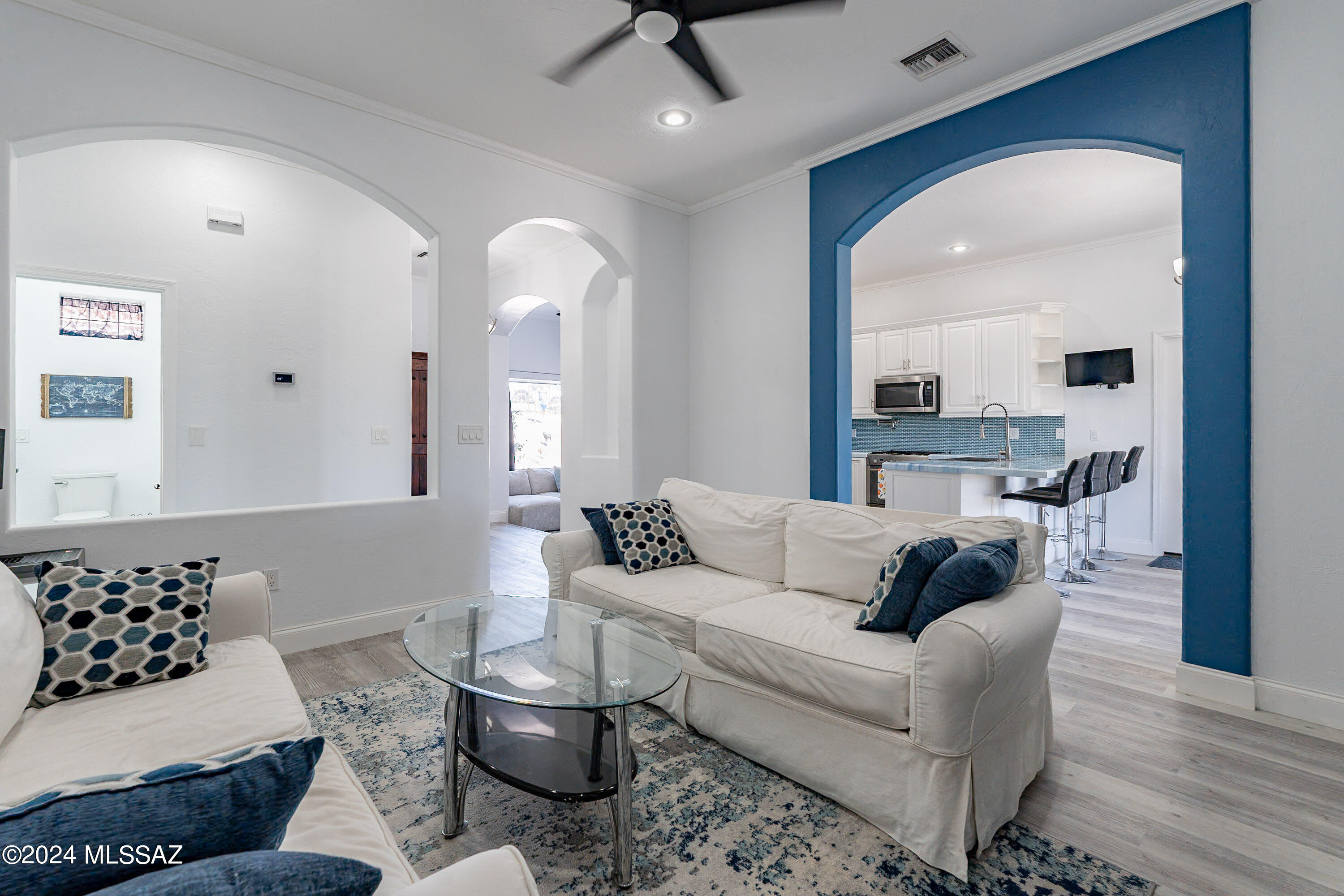 1009 Calle Coyote Rio Rico, AZ 85648 - Photo 5 of 28 a living room with furniture and view of wooden floor