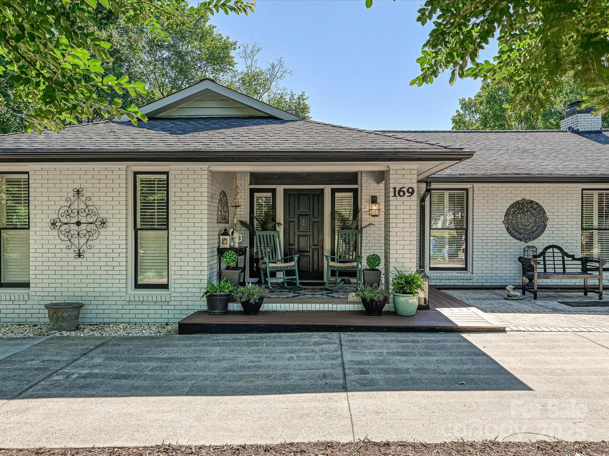 169 Spring Run Road Mooresville, NC 28117 - Photo 2 of 41 a front view of a house with garden