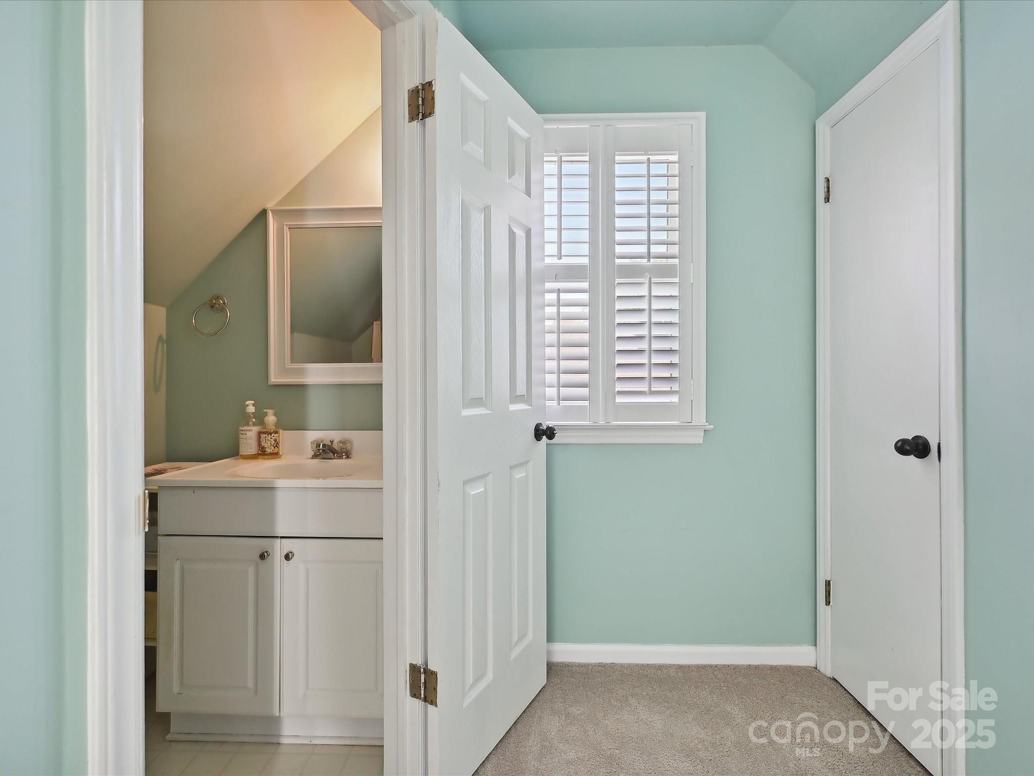 169 Spring Run Road Mooresville, NC 28117 - Photo 33 of 41 a bathroom with a sink a toilet and a shower
