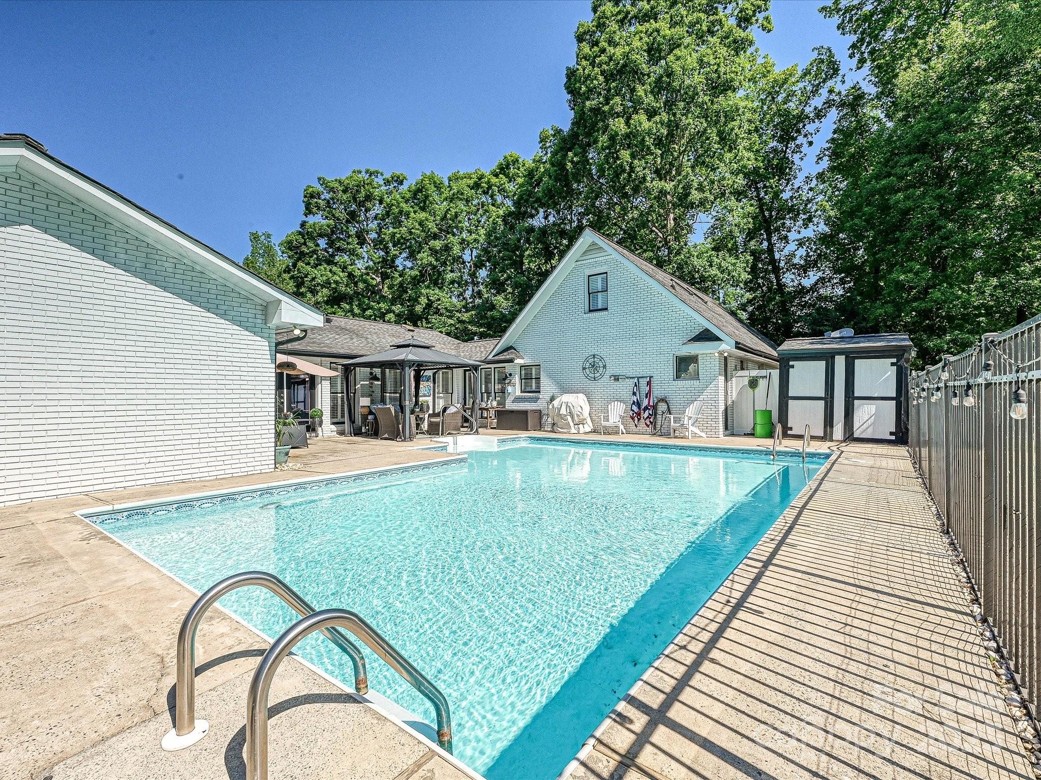 169 Spring Run Road Mooresville, NC 28117 - Photo 36 of 41 a view of house with a swimming pool