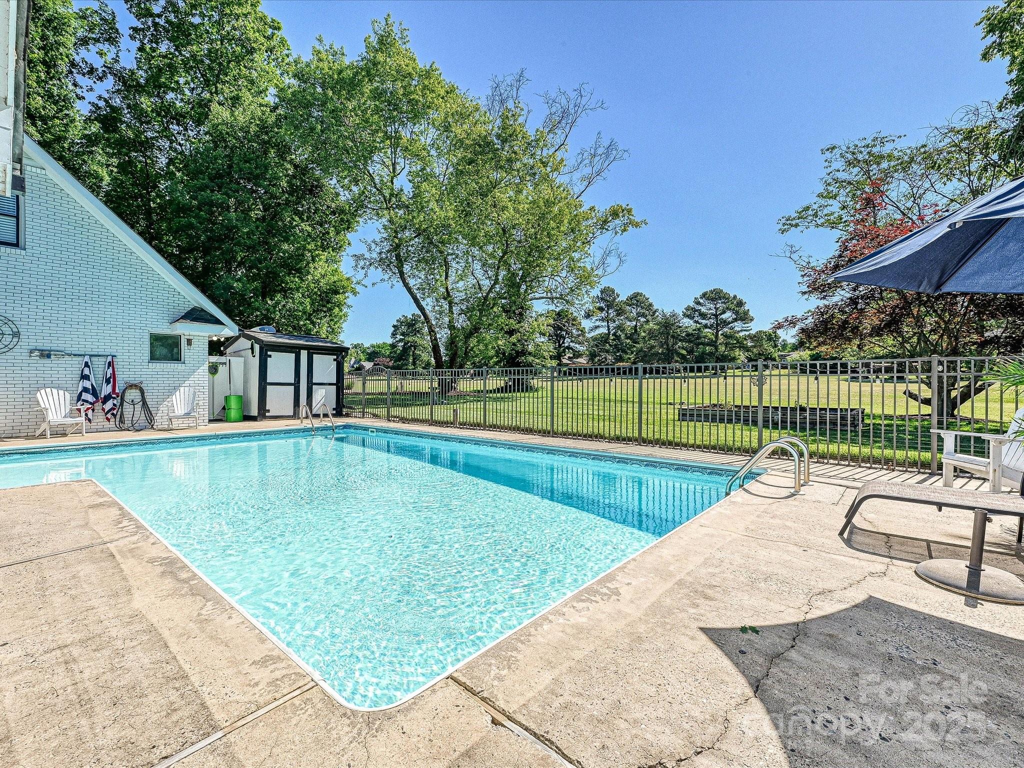 169 Spring Run Road Mooresville, NC 28117 - Photo 38 of 41 swimming pool with outdoor seating