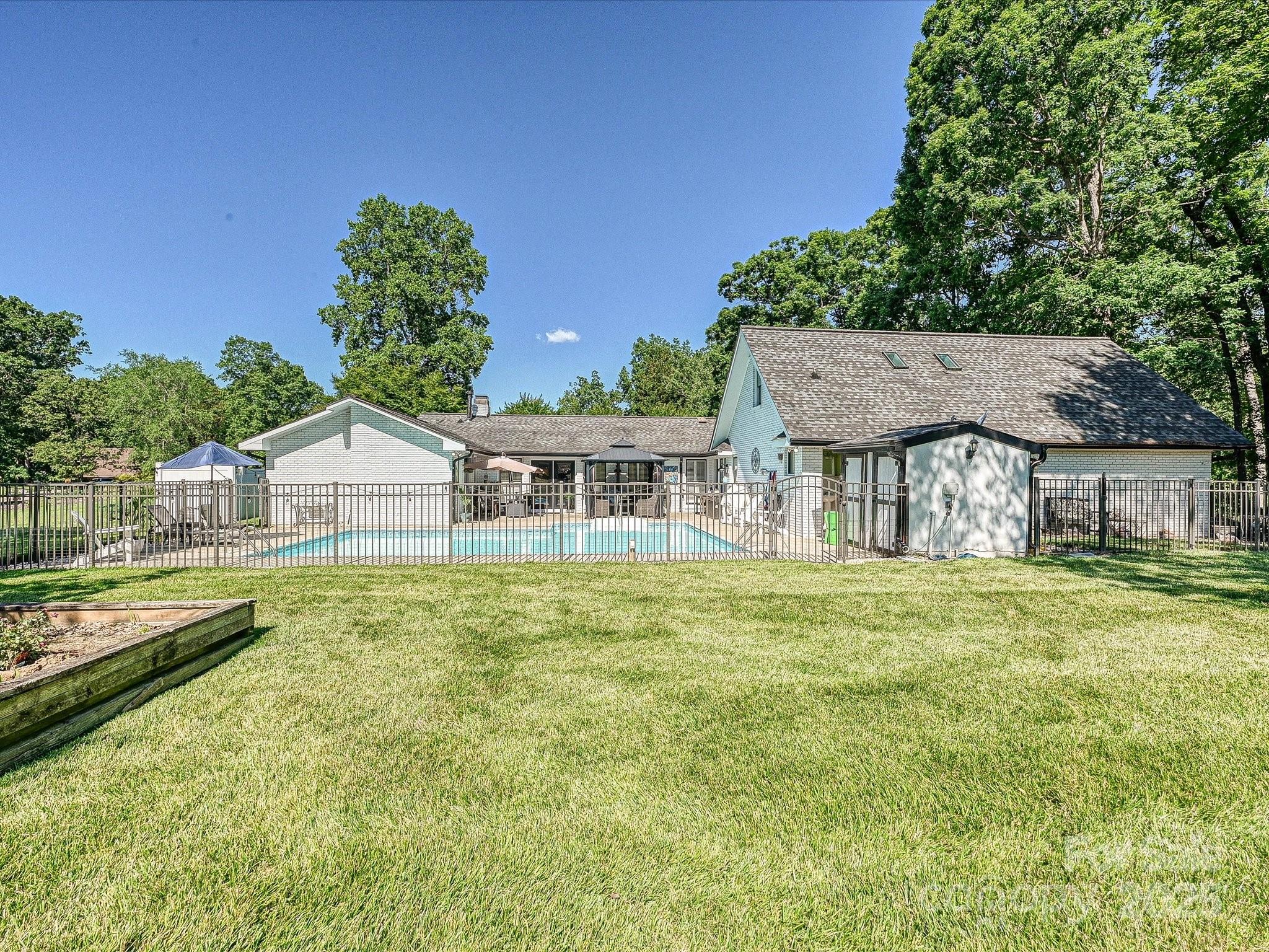 169 Spring Run Road Mooresville, NC 28117 - Photo 41 of 41 a view of a house with a yard and a large tree