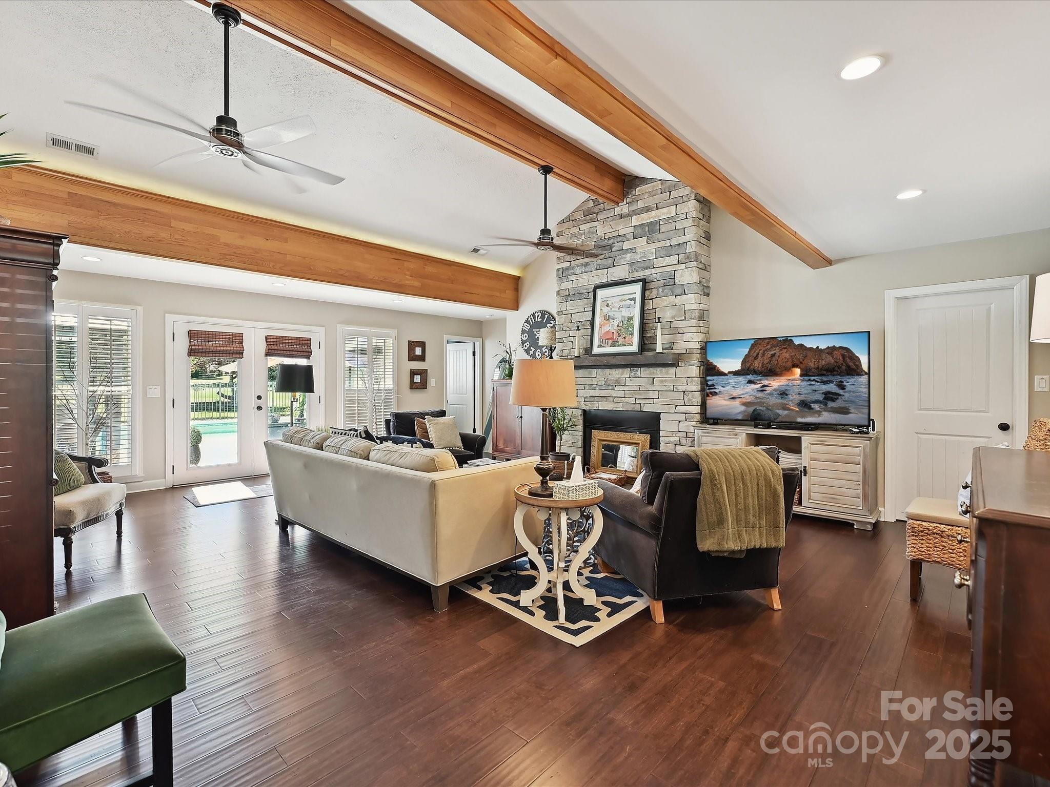 169 Spring Run Road Mooresville, NC 28117 - Photo 7 of 41 a living room with fireplace furniture and a wooden floor